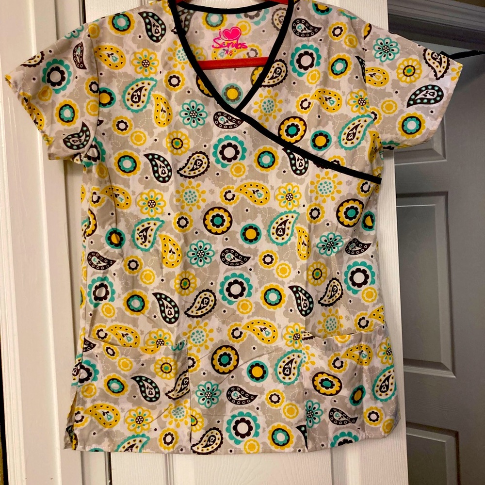 Selling all 3 patterned scrub tops together